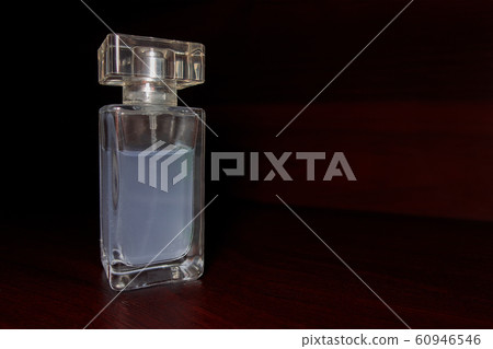Transparent glass bottle with sky blue liquid on Transparent glass bottle with sky blue liquid on 60946546