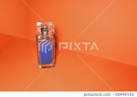 Transparent glass bottle with blue liquid on Transparent glass bottle with blue liquid on 60946548