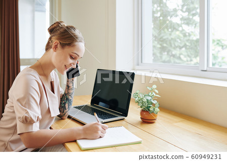 Woman calling to client 60949231