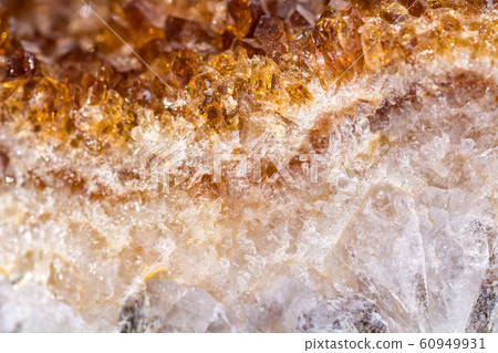 Citrine mineral close up. Gemstone rich background Citrine mineral close up. Gemstone rich background 60949931