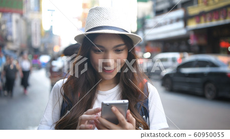 Travel concept. Beautiful girl searching for Travel concept. Beautiful girl searching for 60950055