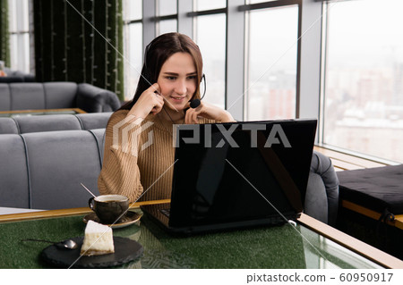 girl leads some online broadcast from the coffee girl leads some online broadcast from the coffee 60950917