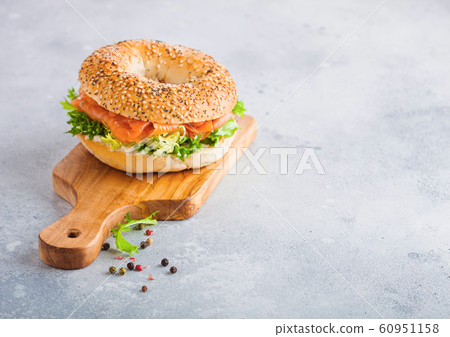 Fresh healthy bagel sandwich with salmon, ricotta Fresh healthy bagel sandwich with salmon, ricotta 60951158