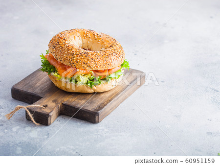 Fresh healthy bagel sandwich with salmon, ricotta Fresh healthy bagel sandwich with salmon, ricotta 60951159