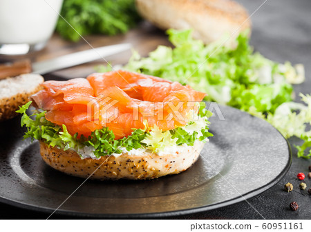 Fresh healthy bagel sandwich with salmon, ricotta Fresh healthy bagel sandwich with salmon, ricotta 60951161