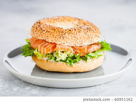 Fresh healthy bagel sandwich with salmon, ricotta Fresh healthy bagel sandwich with salmon, ricotta 60951162