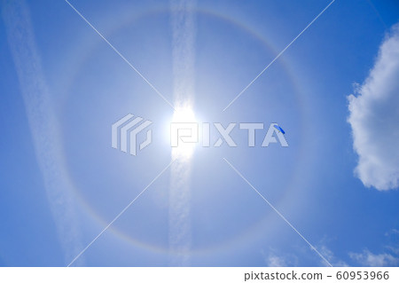 Halo, contrail and paraglider 60953966