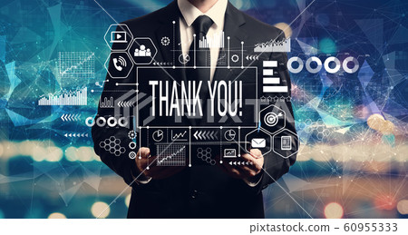 Thank you message with businessman holding a tablet 60955333