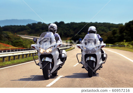 Highway Patrol Policeman on Motorbike Highway Patrol Policeman on Motorbike 60957216