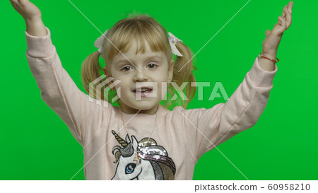 Girl in unicorn sweatshirt dancing. Happy four years old child. Chroma Key Girl in unicorn sweatshirt dancing. Happy four years old child. Chroma Key 60958210