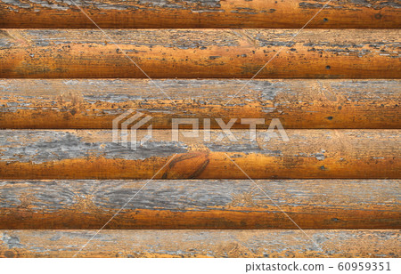 Wooden wall made of painted logs. Natural 60959351