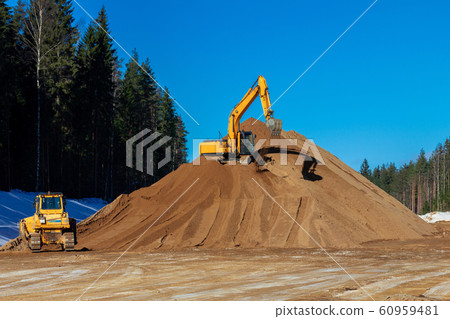 Yellow Excavator and bulldozer at Work in forest Yellow Excavator and bulldozer at Work in forest 60959481