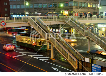 Night landscape in front of Nagasaki station where it rains Night landscape in front of Nagasaki station where it rains 60960852