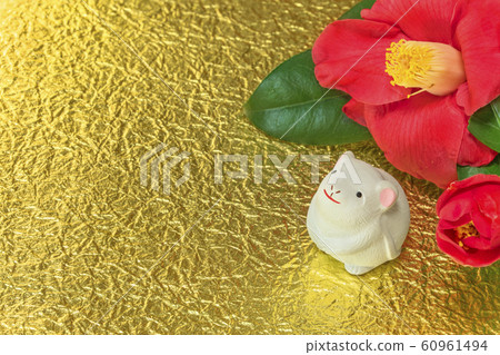 Greete, a cute figure of a 2020 zodiac rat, standing on gold leaf paper, also called camellia flowers, also known as winter roses 60961494