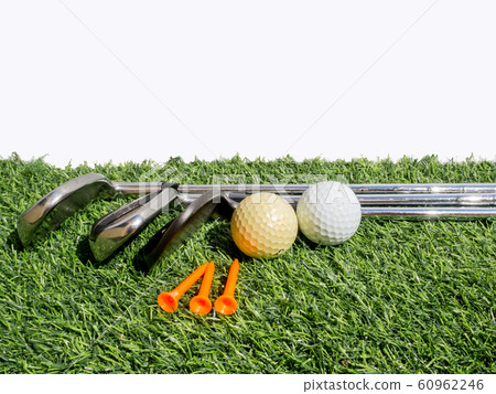 Golf essentials with artificial grass on white background Golf essentials with artificial grass on white background 60962246