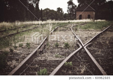 Moody and atmospheric toned abandoned railway yards at the end of the line in Cowra, rural NSW, Australia Moody and atmospheric toned abandoned railway yards at the end of the line in Cowra, rural NSW, Australia 60962885