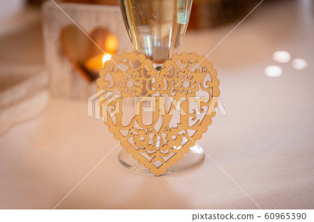 Love concept.  Champagne glass with love text on accessories 60965390