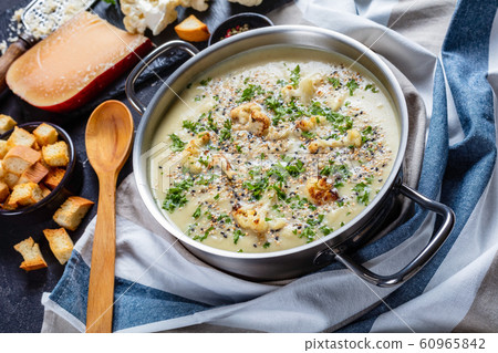 close-up of Creamy roasted garlic cauliflower soup close-up of Creamy roasted garlic cauliflower soup 60965842