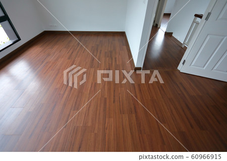 brown wood laminate floor in residential house 60966915