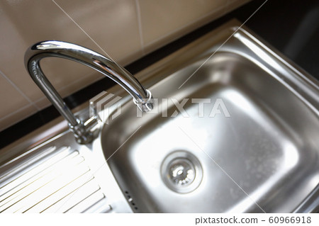 water faucet closed and empty stainless sink cooking in kitchen room water faucet closed and empty stainless sink cooking in kitchen room 60966918