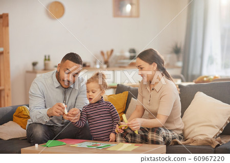 Modern Family Playing with Cute Little Daughter at Home Modern Family Playing with Cute Little Daughter at Home 60967220