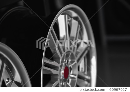 ar drives in the store with black background. Chrome car wheels for sale. ar drives in the store with black background. Chrome car wheels for sale. 60967927