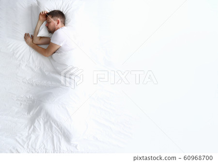 Young caucasian beauty woman sleeping on white bed Young caucasian beauty woman sleeping on white bed 60968700