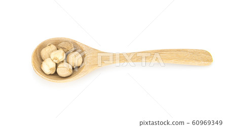 siam cardamom on spoon on white background 60969349