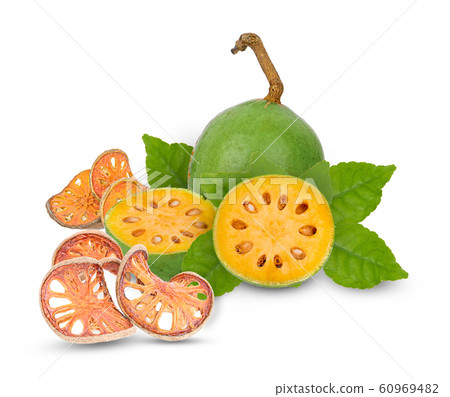 Aegle marmelos and Dry bael fruit on white 60969482