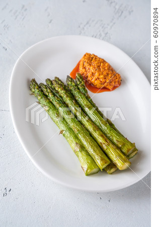 Fried asparagus with romesco sauce 60970894