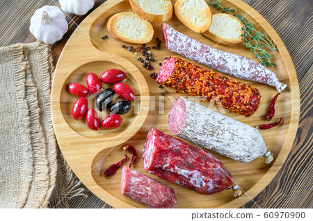 Assortment of salami with appetizers 60970900