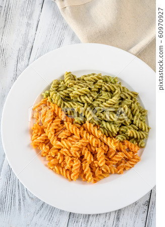 Fusilli with traditional and tomato pesto 60970927