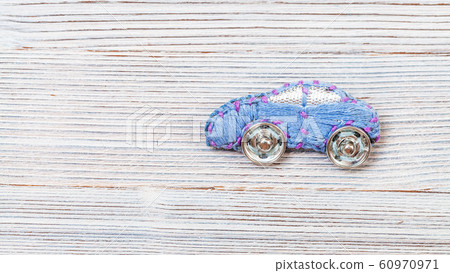 car brooch embroidered by silk threads on gray car brooch embroidered by silk threads on gray 60970971