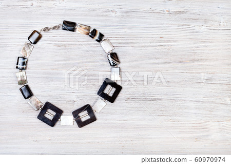 necklace from horn, agate and nacre beads on gray necklace from horn, agate and nacre beads on gray 60970974