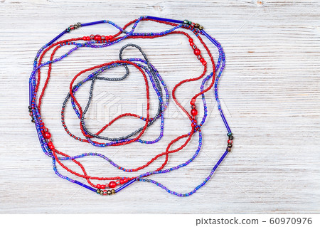 necklace and bracelet from glass beads on gray necklace and bracelet from glass beads on gray 60970976