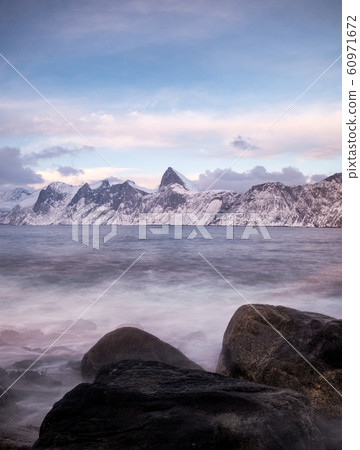 Seascape Segla mountain on coastline in winter at 60971672
