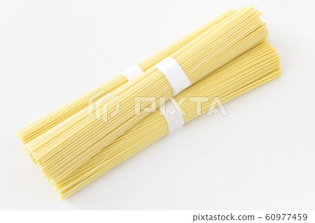 Bunch of dried spaghetti noodles Bunch of dried spaghetti noodles 60977459