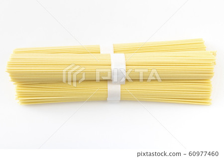 Bunch of dried spaghetti noodles Bunch of dried spaghetti noodles 60977460