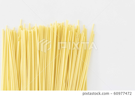 Bunch of dried spaghetti noodles Bunch of dried spaghetti noodles 60977472