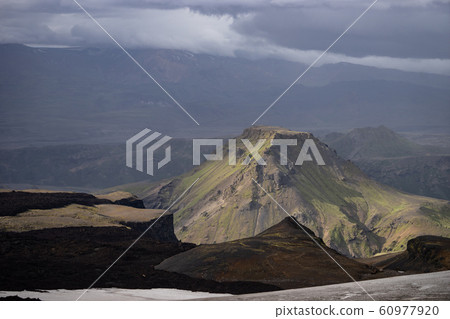 Mountain peak with and clouds on the laugavegur Hiking trail close to Thorsmork Mountain peak with and clouds on the laugavegur Hiking trail close to Thorsmork 60977920