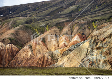Landmannalaugar Colorful mountains on the Laugavegur hiking trail. Iceland. The combination of Landmannalaugar Colorful mountains on the Laugavegur hiking trail. Iceland. The combination of 60977923