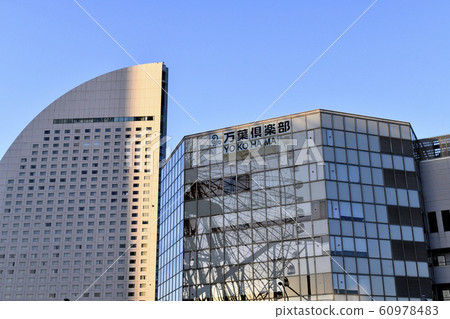 Yokohama cityscape in Japan, looking at the Ferris wheel reflected in the Manyo Club 60978483