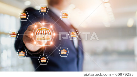 .Businessman hand touching icon global network connection on franchise marketing system. Branch of market and customer. Modern technology business. .Businessman hand touching icon global network connection on franchise marketing system. Branch of market and customer. Modern technology business. 60979283