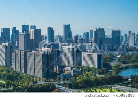 Tokyo cityscape in Japan overlooking Kasumigaseki's government office (Mt. Fuji in the back) 60982898