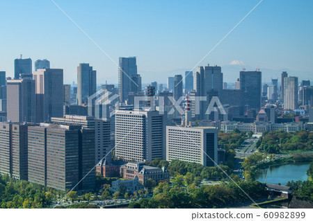 Tokyo cityscape in Japan overlooking Kasumigaseki's government office (Mt. Fuji in the back) 60982899