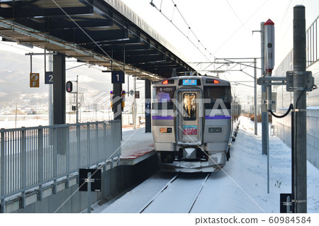 Photographing the winter landscape of the Kodate Liner at Shin-Hakodate Station in Hokuto City, Hokkaido Photographing the winter landscape of the Kodate Liner at Shin-Hakodate Station in Hokuto City, Hokkaido 60984584