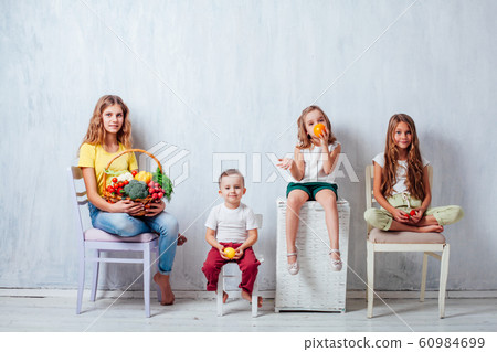 children sit with fresh vegetables healthy eating fruit children sit with fresh vegetables healthy eating fruit 60984699