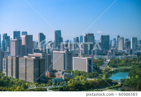 Tokyo cityscape in Japan overlooking Kasumigaseki's government office (Mt. Fuji in the back) Tokyo cityscape in Japan overlooking Kasumigaseki's government office (Mt. Fuji in the back) 60986565