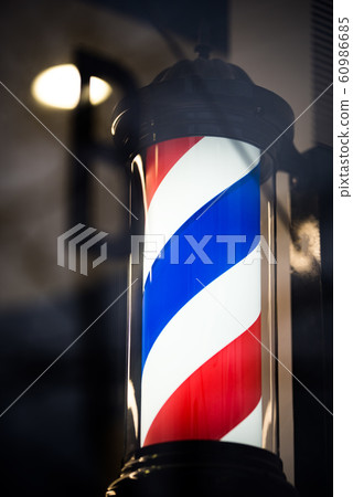 the sign of the Barber shop with dark caps 60986685