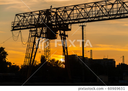 overhead crane at the railway station. Crane 60989631